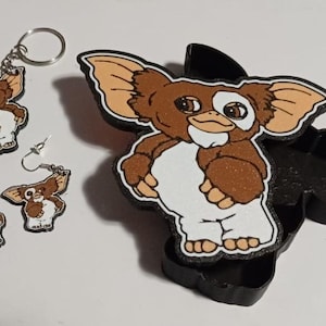 Gizmo Gremlins-Geschenkbox, Ohrringe und Schlüsselanhänger.