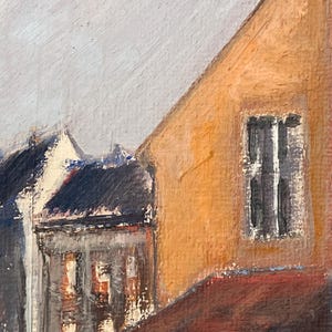 May include: A painting of a street scene with a yellow building on the right and a gray building on the left. The yellow building has a window with black bars. The sky is a light gray.