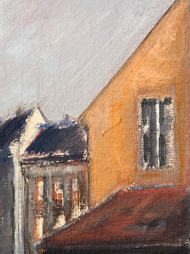 May include: A painting of a street scene with a yellow building on the right and a gray building on the left. The yellow building has a window with black bars. The sky is a light gray.