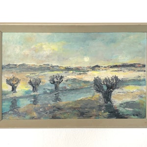 May include: A framed oil painting depicting a landscape with four trees in the foreground and a distant horizon. The sky is a pale blue with hints of yellow and white clouds. The trees are dark green and brown, and the ground is a mixture of brown, green, and white.