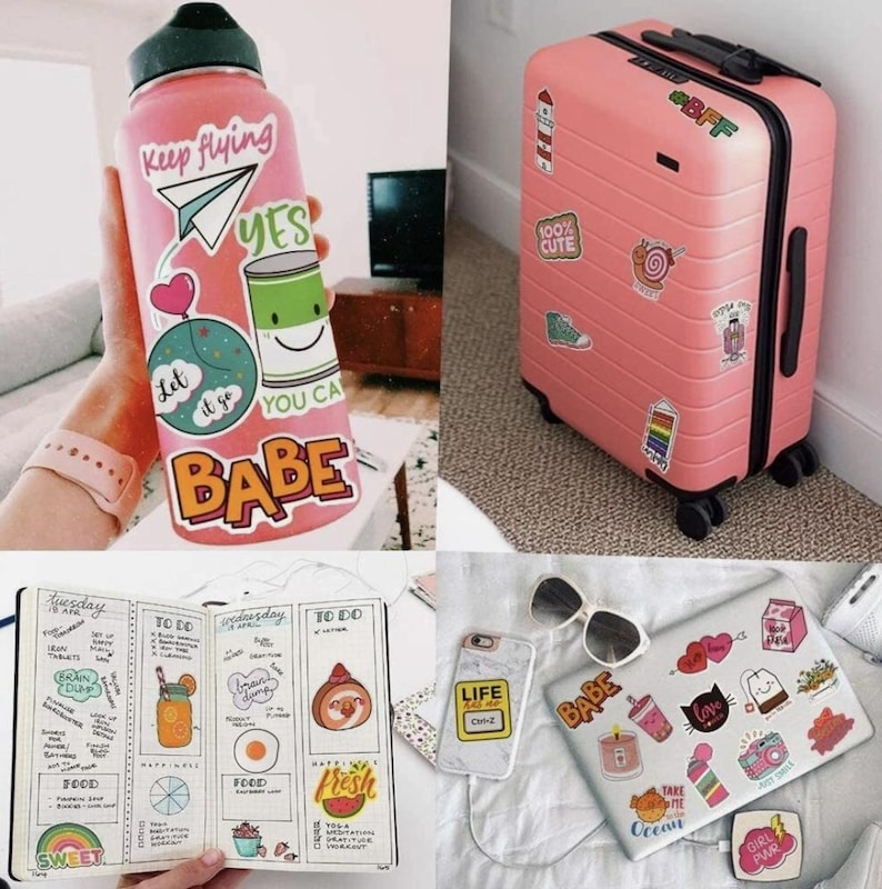 May include: A collage of items featuring stickers. A pink water bottle with stickers that say "Keep Flying" and "Babe". A pink suitcase with stickers. A notebook with drawings and text. A laptop, phone, and sunglasses with stickers.
