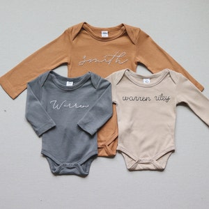 Custom hand-embroidered long-sleeve bodysuit