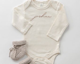 Custom hand-embroidered long-sleeve bodysuit