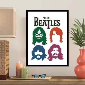 Könnte beinhalten: Ein schwarz-weiß gerahmter Druck mit dem Text "THE BEATLES" in schwarzen Buchstaben. Der Druck zeigt vier Silhouette-Porträts der Beatles in Grün, Orange, Blau und Lila.