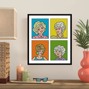Puede incluir: Una impresión enmarcada de cuatro retratos pixelados de mujeres con cabello rubio. Las mujeres visten atuendos de diferentes colores y están dispuestas en una cuadrícula. El fondo es blanco.