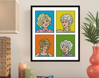 May include: A framed print of four pixelated portraits of women with blonde hair. The women are wearing different colored outfits and are arranged in a grid pattern. The background is white.