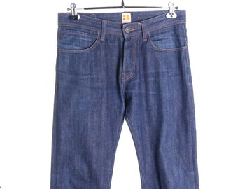 Vaqueros Hugo Boss naranjas de mezclilla cruda, algodón azul marino con orillo, talla 32/34