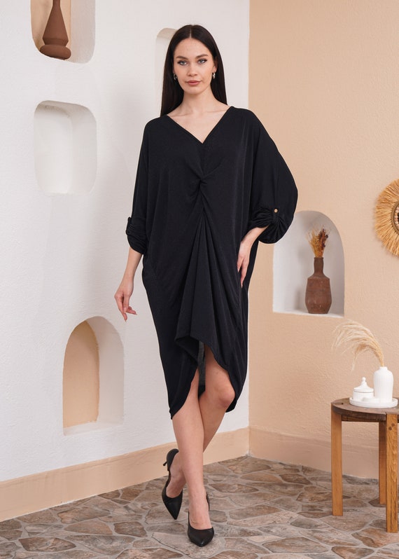 Minivestido de manga con botones detallado en la parte delantera