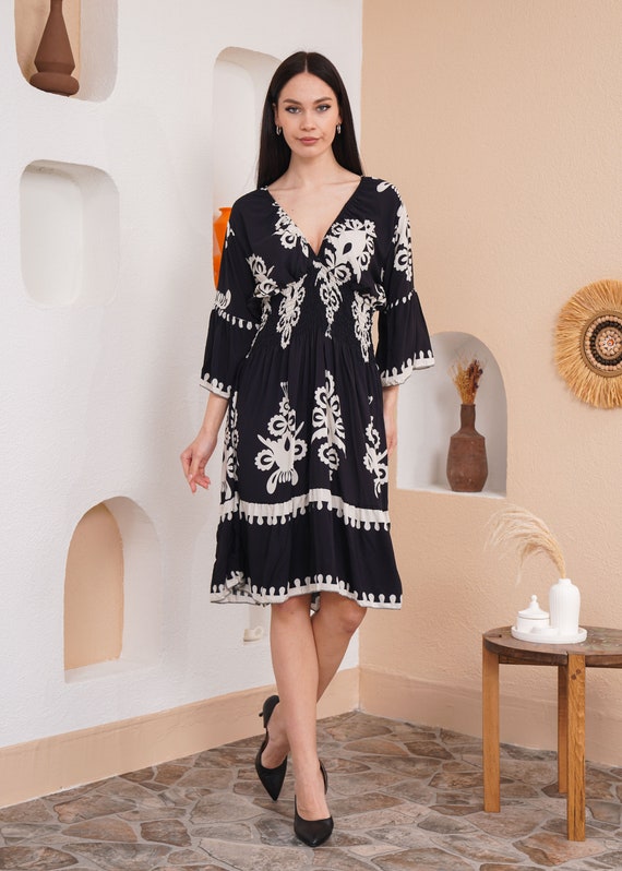 black long sleeve sheath dress Shop Knee-Length Dress with 3/4 Sleeves and V-Neck main image 1