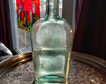 Vintage Green Glass Liquor Bottle: Tombstone Pocket Flask, Antique Decor