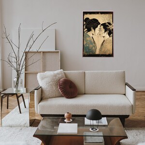 May include: A vintage-style print of two women in traditional Japanese clothing, with their faces close together, set against a beige background with a black frame.