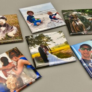 May include: A set of 10 square photo magnets featuring various images, including a wedding couple, a family at the beach, a dog, and a man with sunglasses. The magnets are printed on a glossy surface and have a white border.