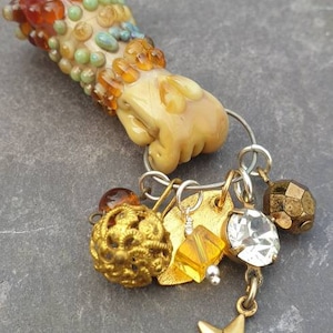 Flameworked lampwork figa charm with treasures