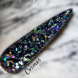 Cosmos dip powder-  black dip with  flakies and iridescent shard dip powder. wintery dip powder. DIY dip nails. Dual purpose acrylic powder.