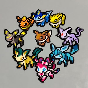 Eevee and Eeveelutions • PixelCharm/Pin/Magnet