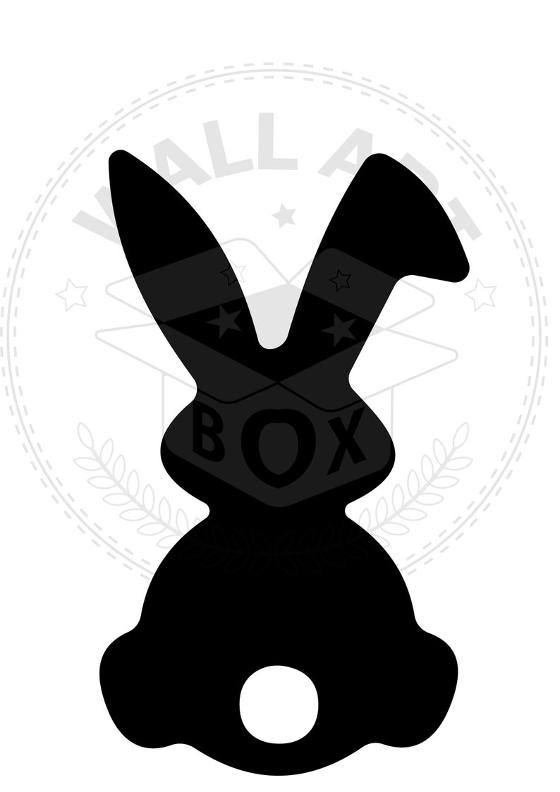 K&ouml;nnte beinhalten: Schwarze Silhouette eines Kaninchens mit langen Ohren und einem kleinen Kreis, der unten ausgeschnitten ist. Das Kaninchen befindet sich vor einem wei&szlig;en Hintergrund mit einem grauen Kreis, der den Text "WALL ART BOX" in Schwarz enth&auml;lt.