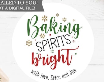May include: Round white sticker with green and red text that reads "Baking Spirits Bright" with the words "with love, Erica and Jim" at the bottom.