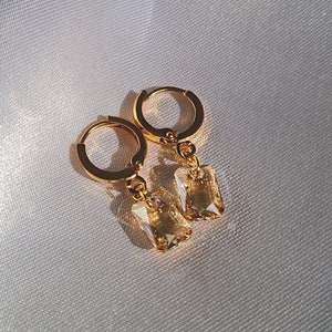 Thick gold sleeper earrings with faceted rectangle pendant in golden beige Swarovski crystal, Petit Talisman model