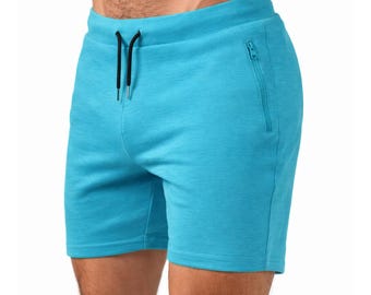 Herrträningsshorts i 100 % merinoull – 13 cm innerbenslängd – Atletisk passform – Blixtlåsficka