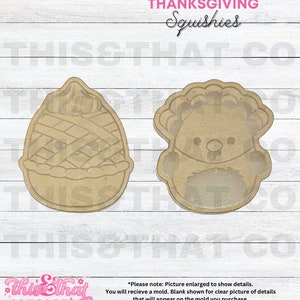 May include: Two brown wooden cookie cutters, one shaped like a pie and the other shaped like a turkey. The cookie cutters are on a light wood background. The text "THANKSGIVING Squishies" is at the top of the image.