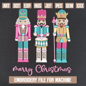 May include: Three embroidered nutcracker designs in pink, blue, and gold. The nutcrackers are holding a drum, a staff, and a heart. The text "merry Christmas" is below the nutcrackers. The text "EMBROIDERY FILE FOR MACHINE" is below the text "merry Christmas".