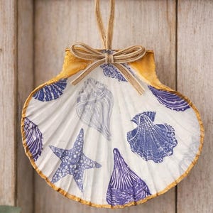 Hand decorated and decoupaged hanging shell decoration blue and white shells  11-13cm
