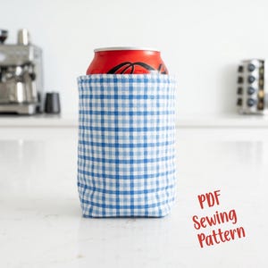 May include: A handmade wooden sign with the text "Welcome" in a handwritten style. The sign is painted white with a distressed finish, and a small green leaf is attached to the top. The sign is designed for indoor or outdoor use.