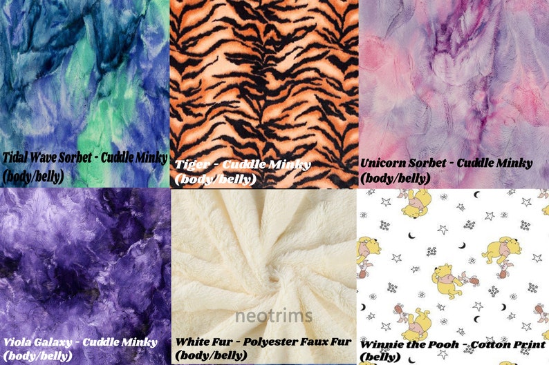 K&ouml;nnte beinhalten: Sechs Stoffmuster f&uuml;r eine Babydecke. Die Muster sind: Tidal Wave Sorbet, Tiger, Unicorn Sorbet, Viola Galaxy, White Fur und Winnie the Pooh. Die Muster sind alle Cuddle Minky, au&szlig;er das White Fur, das aus Polyester-Kunstpelz besteht. Das Winnie the Pooh Muster ist ein Baumwolldruck.