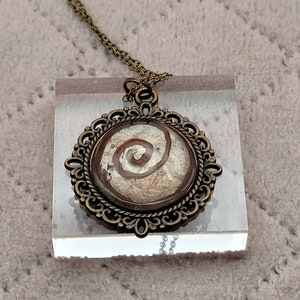 Cinnamon Swirl Inspired Pendant Necklace.