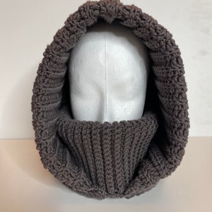 Crochet neck cowl in brown yarn.