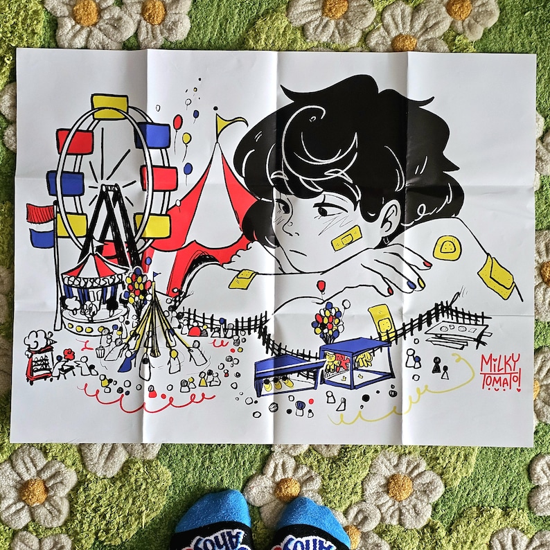 May include: A black and white illustration of a person with black hair sitting in front of a colourful carnival scene. The person is wearing a bandage on their face and has their arm resting on their lap. The carnival scene includes a Ferris wheel, a tent, and a variety of other carnival attractions. The text "MILKY TOMATO!" is written in the bottom right corner of the image.