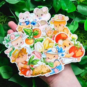 May include: A set of nine colorful stickers featuring cartoon hamsters in various poses. The stickers depict hamsters wearing hats, holding flowers, and gardening. The stickers are perfect for adding a touch of whimsy to laptops, water bottles, or journals.