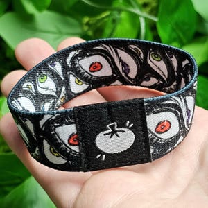 Pulsera de ojos de arcoíris