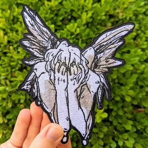 ¡Parche de ángel caído!