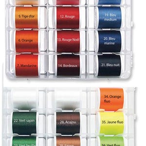 May include: A clear plastic organizer filled with 40 spools of colorful thread. Each spool is labeled with a color name, including shades of yellow, orange, red, blue, green, and neutral tones. The thread is likely for sewing or embroidery.