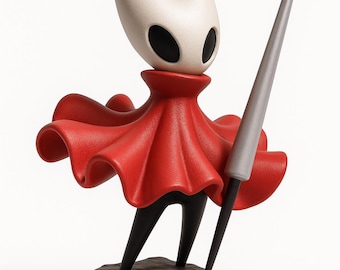 Puede incluir: Figura de un personaje con cabeza blanca y dos cuernos, ojos negros y capa roja. La figura sostiene una lanza plateada y está sobre una base de piedra gris. Las piernas del personaje son negras.