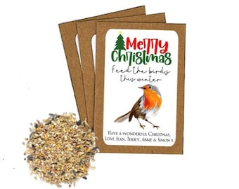 May include: Three brown paper bags with a white label that says "Merry Christmas Feed the birds this winter". A robin illustration is on the label. The text "Have a wonderful Christmas, Love Jean, Terry, Abbie & Simon X" is at the bottom of the label.
