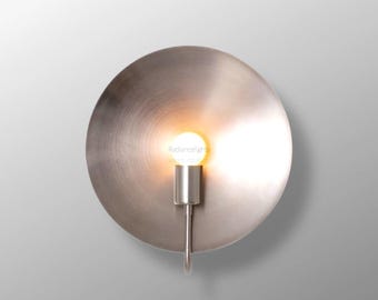 Moderne koperen wandkandelaar: minimalistisch licht uit het midden van de eeuw