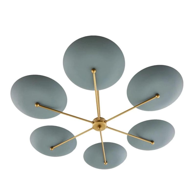 A modern brass sputnik chandelier featuring six matte blue disc shades against a white background.