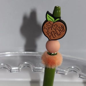 Stylo couleur pêche