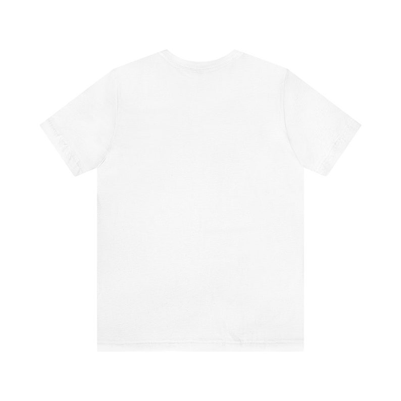 May include: A plain white t-shirt with short sleeves.