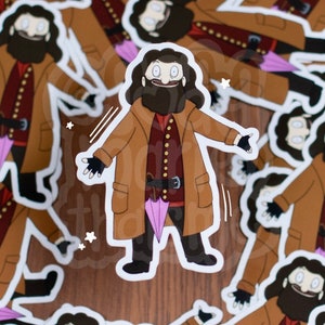 May include: A sticker featuring a cartoon illustration of a character with a long brown coat, a dark beard, and a red vest. The character is holding a pink umbrella. The sticker has a white border and is surrounded by other similar stickers.