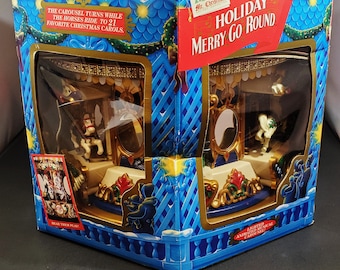 Mr. Christmas Innovación navideña Holiday Merry go round con 21 canciones ¡¡Muy bonito!! 1994