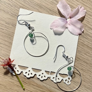 Round delicate spiral earrings