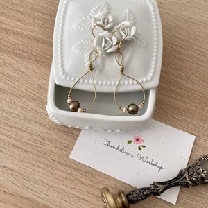 Elegant teardrop earrings with stone and crystals