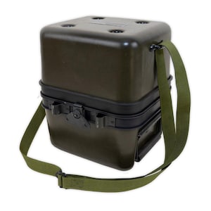 May include: A green, rectangular, hard-sided case with a black handle and a green adjustable shoulder strap. The case has a black latch and a black metal band around the middle.