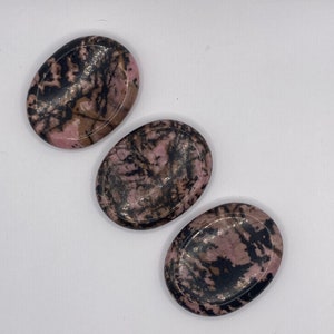 Rhodonite worry thumb stone crystal