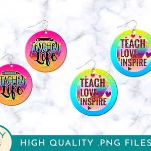 May include: Three pairs of colorful teacher earrings with different designs. The first pair features a rainbow background with the text "Teacher Life". The second pair features a rainbow background with the text "Teach Love Inspire". The third pair features a blue background with the text "Teach Love Inspire".