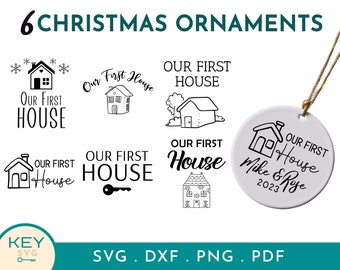 May include: Six black and white Christmas ornament designs featuring the text "Our First House" with a house illustration. One ornament design includes the text "Mike & Rose 2023".