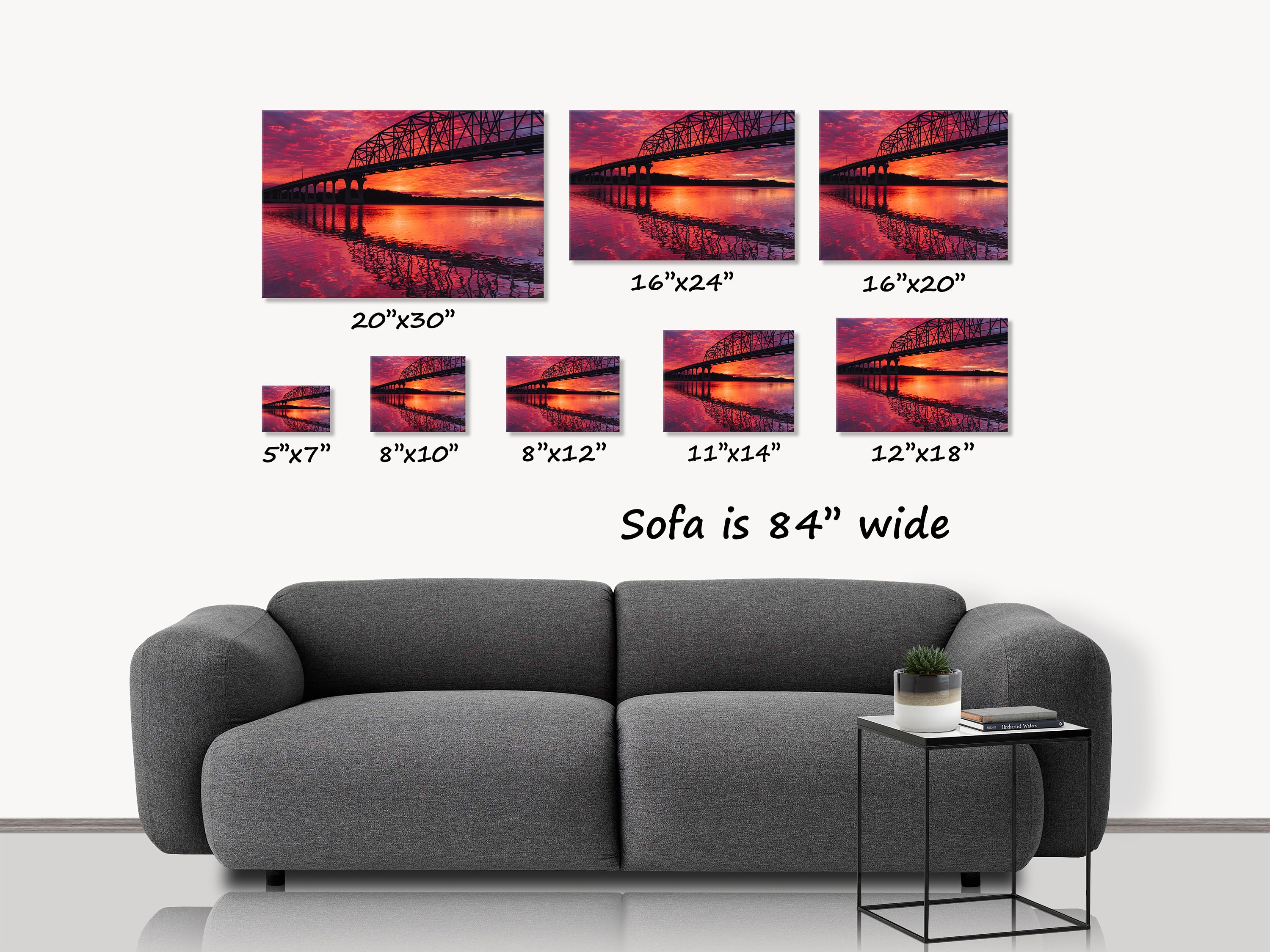 Steel Truss Bridge Silhouetted by Colorful Sunset Clouds